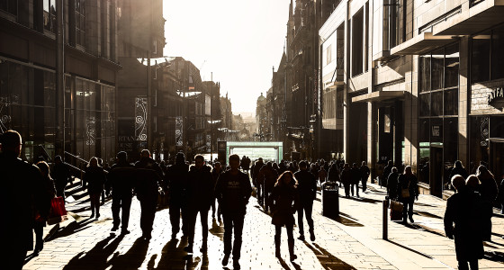 Many people walking down Buchanan street in Glasgow, Scotland