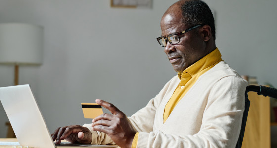 Man using his credit card.