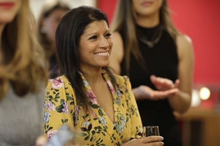 Lisa Picardo, smiling and clapping, at London Stock Exchange event.