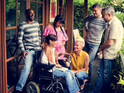 Diverse group of friends talking and laughing