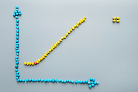 Graph made of sweets with increasing line