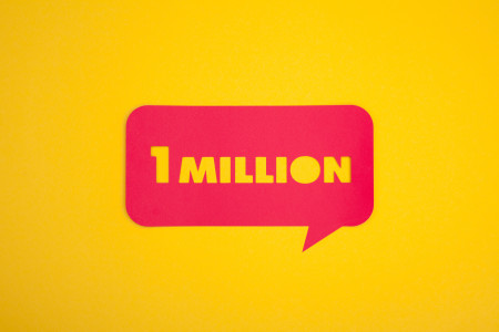 One million sign on yellow background