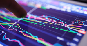 Stock market data graph on tablet.