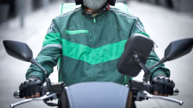 Grab, GoJek drivers push back against merger and pay cuts Grab, GoJek drivers push back against merger and pay cuts