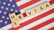 How long can H-1B visa holders stay in the US after losing their jobs?