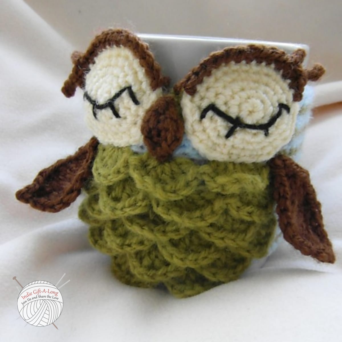 Mug wrapped in crocheted owl.