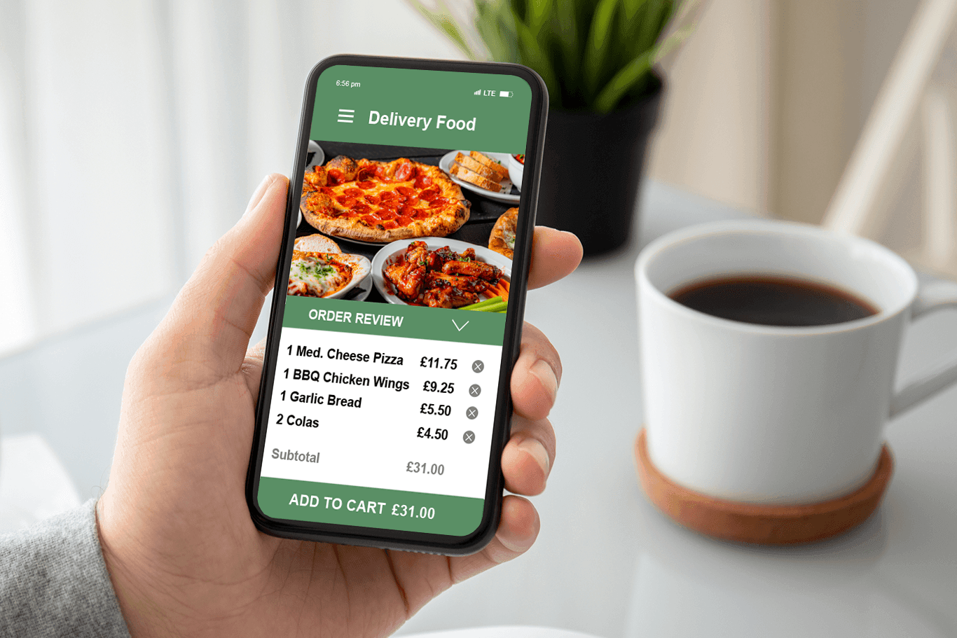 Person ordering pizza on their smartphone using SkyTab POS online ordering