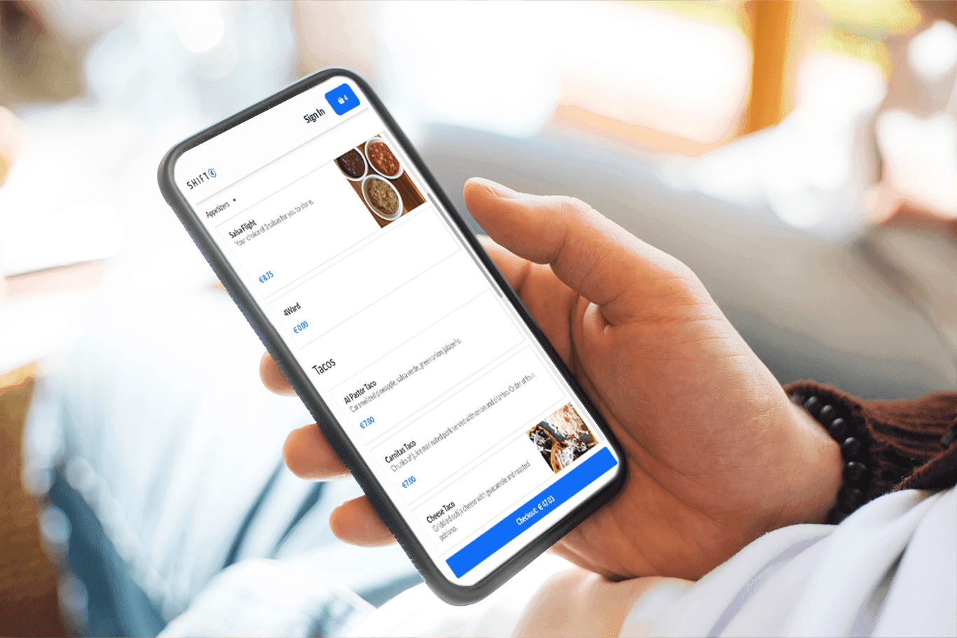 Customer ordering food online on a smartphone with SkyTab Online in-house ordering