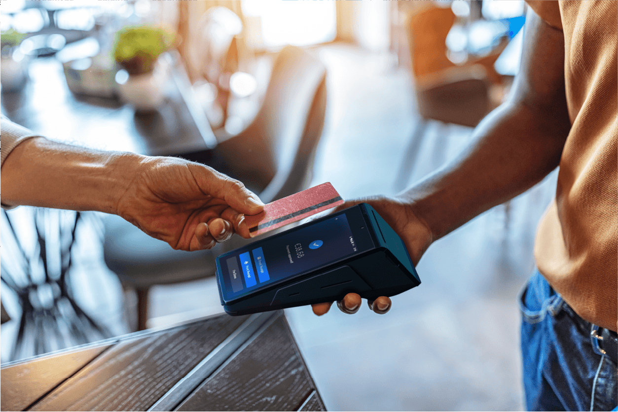Customer paying with a credit card on a SkyTab Solo portable card machine