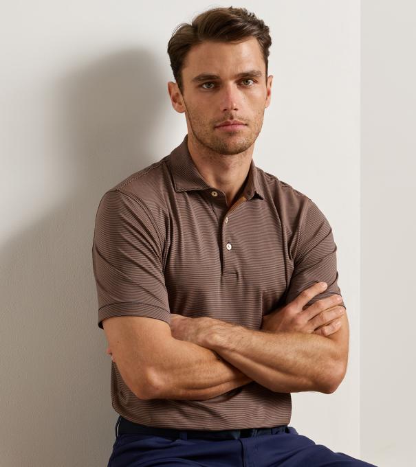 Jubilee Performance Jersey Polo in NAVY / DARK AMBER