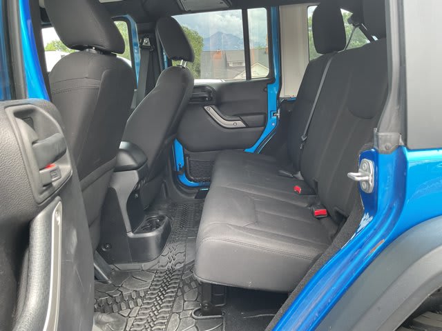 2015 Jeep Wrangler Unlimited used convertible for sale at Peterson Auto Sales in Midvale, UT — photo 11 of 21