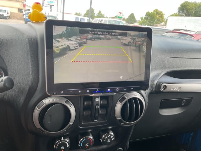 2015 Jeep Wrangler Unlimited used convertible for sale at Peterson Auto Sales in Midvale, UT — photo 15 of 21