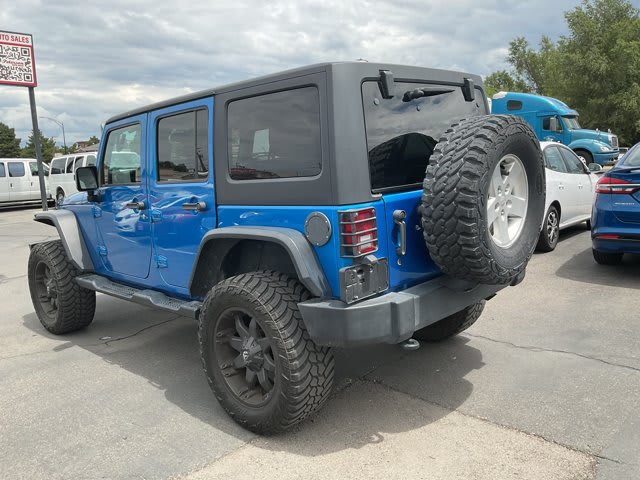 2015 Jeep Wrangler Unlimited used convertible for sale at Peterson Auto Sales in Midvale, UT — photo 7 of 21