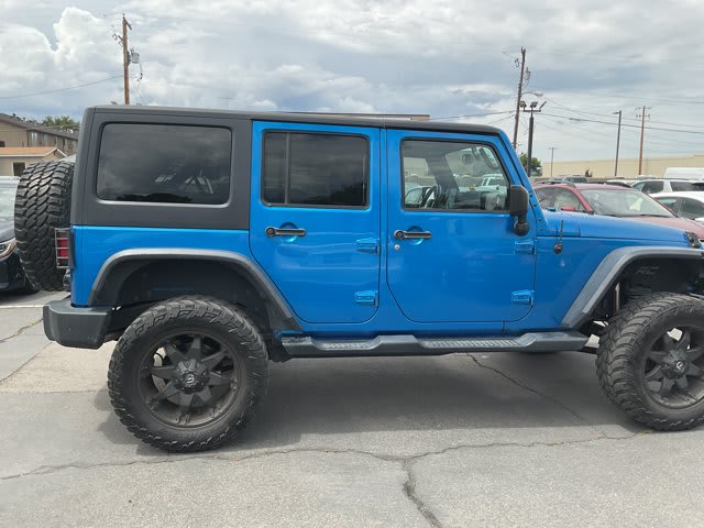 2015 Jeep Wrangler Unlimited used convertible for sale at Peterson Auto Sales in Midvale, UT — photo 5 of 21
