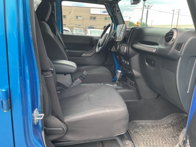 2015 Jeep Wrangler Unlimited used convertible for sale at Peterson Auto Sales in Midvale, UT — photo 9 of 21