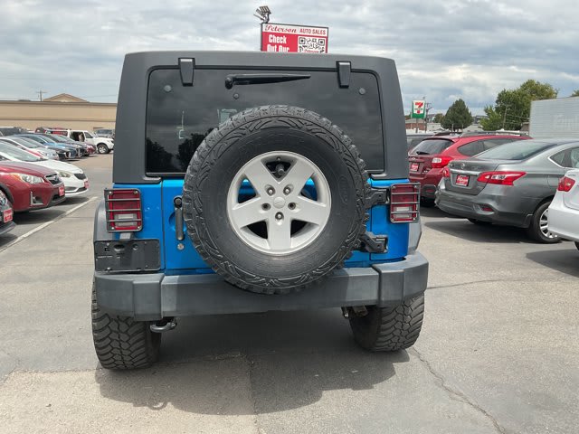 2015 Jeep Wrangler Unlimited used convertible for sale at Peterson Auto Sales in Midvale, UT — photo 8 of 21