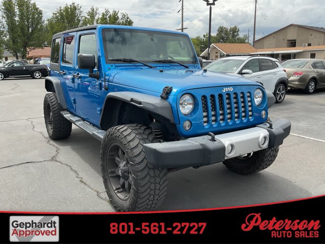 2015 Jeep Wrangler Unlimited used convertible for sale at Peterson Auto Sales in Midvale, UT