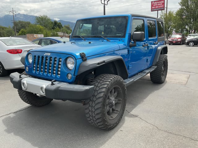 2015 Jeep Wrangler Unlimited used convertible for sale at Peterson Auto Sales in Midvale, UT — photo 2 of 21