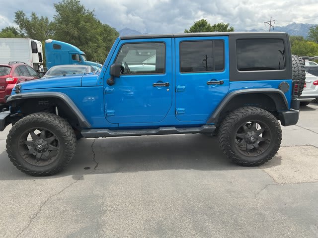 2015 Jeep Wrangler Unlimited used convertible for sale at Peterson Auto Sales in Midvale, UT — photo 4 of 21