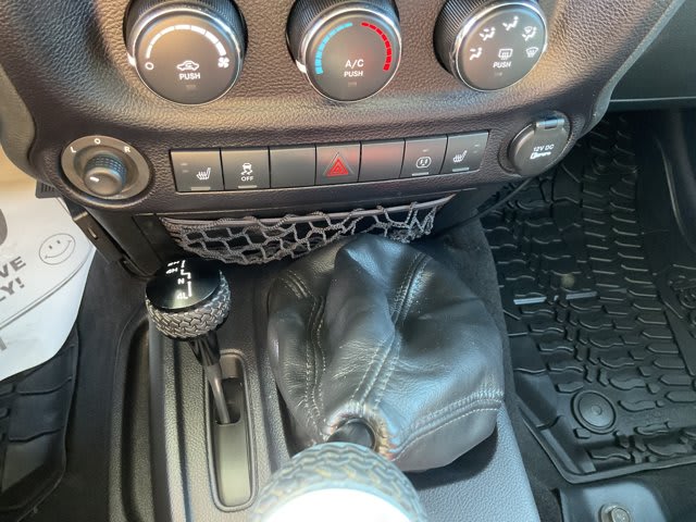 2015 Jeep Wrangler Unlimited used convertible for sale at Peterson Auto Sales in Midvale, UT — photo 17 of 20