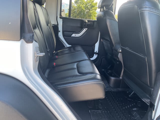 2015 Jeep Wrangler Unlimited used convertible for sale at Peterson Auto Sales in Midvale, UT — photo 14 of 20