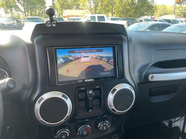 2015 Jeep Wrangler Unlimited used convertible for sale at Peterson Auto Sales in Midvale, UT — photo 15 of 20
