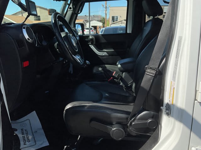 2015 Jeep Wrangler Unlimited used convertible for sale at Peterson Auto Sales in Midvale, UT — photo 10 of 20