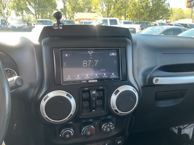 2015 Jeep Wrangler Unlimited used convertible for sale at Peterson Auto Sales in Midvale, UT — photo 16 of 20