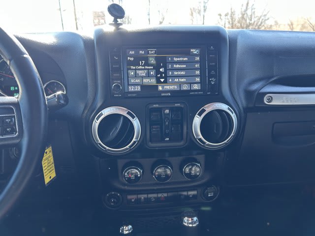 2015 Jeep Wrangler Unlimited used convertible for sale at Peterson Auto Sales in Midvale, UT — photo 17 of 20