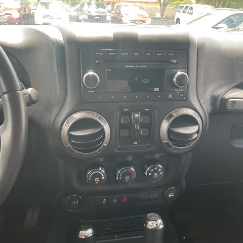 2018 Jeep Wrangler JK Unlimited used convertible for sale at Peterson Auto Sales in Midvale, UT — photo 18 of 23