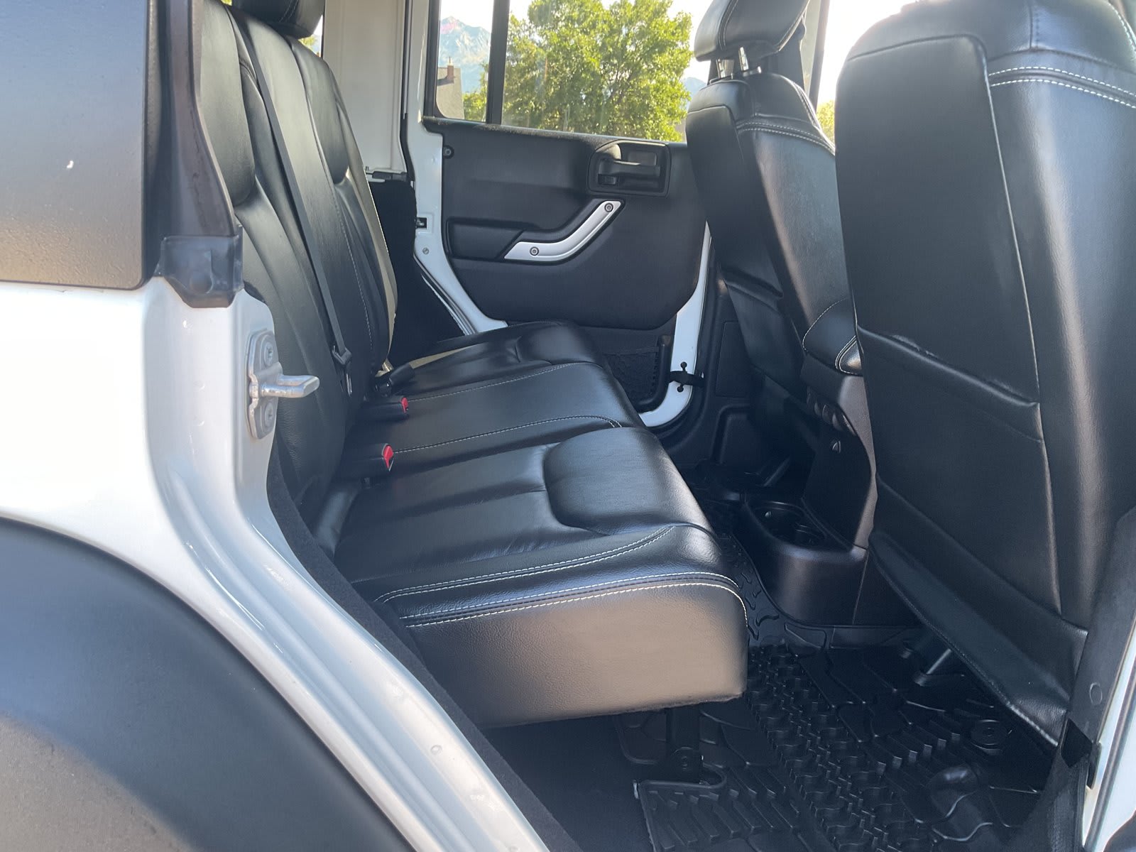 2015 Jeep Wrangler Unlimited used convertible for sale at Peterson Auto Sales in Midvale, UT — photo 14 of 20