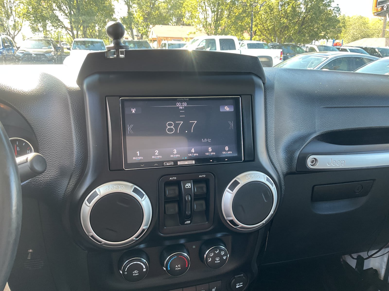 2015 Jeep Wrangler Unlimited used convertible for sale at Peterson Auto Sales in Midvale, UT — photo 16 of 20