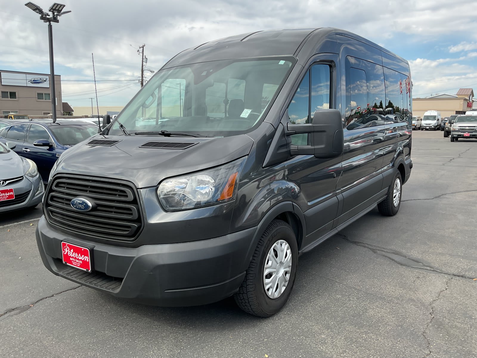 2019 Ford Transit Passenger Wagon used full-size passenger van for sale at Peterson Auto Sales in Midvale, UT — photo 2 of 20