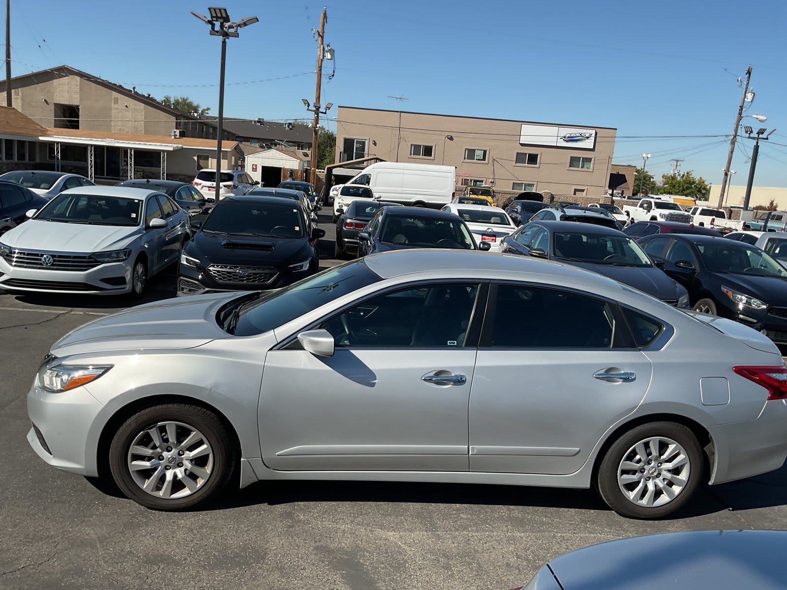 2017 Nissan Altima used 4dr car for sale at Peterson Auto Sales in Midvale, UT — photo 4 of 21