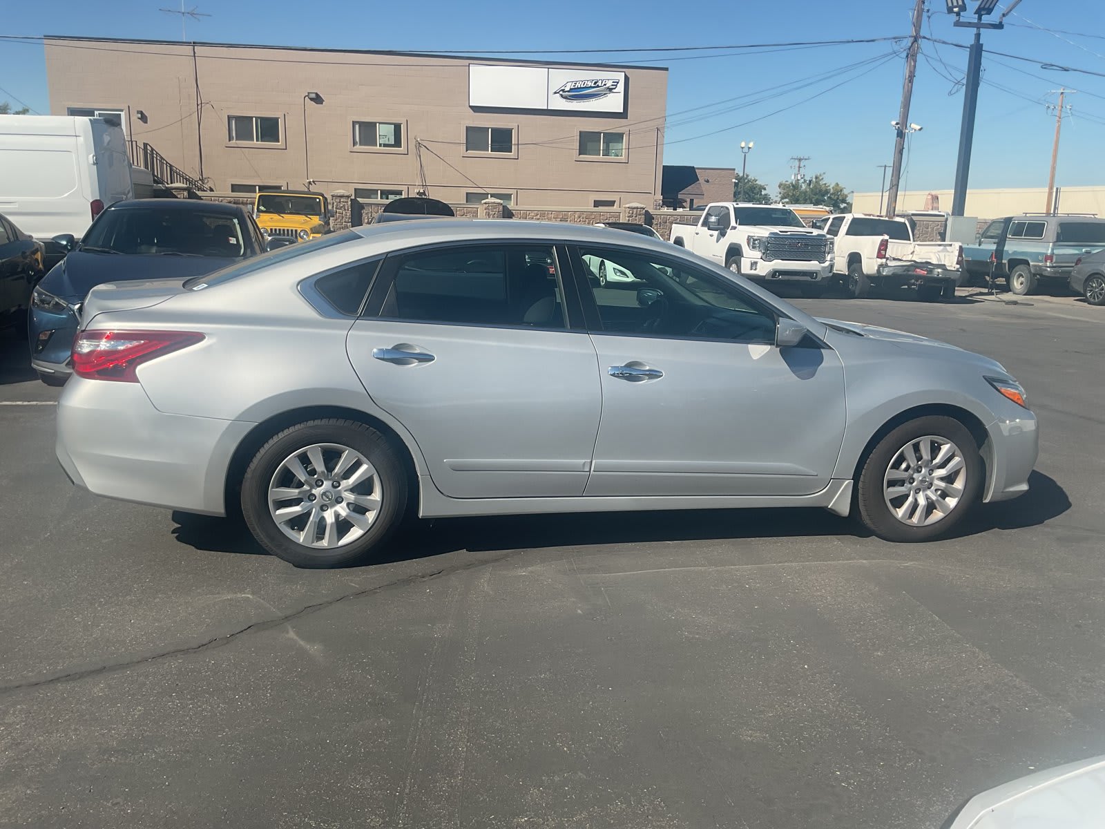 2017 Nissan Altima used 4dr car for sale at Peterson Auto Sales in Midvale, UT — photo 5 of 21