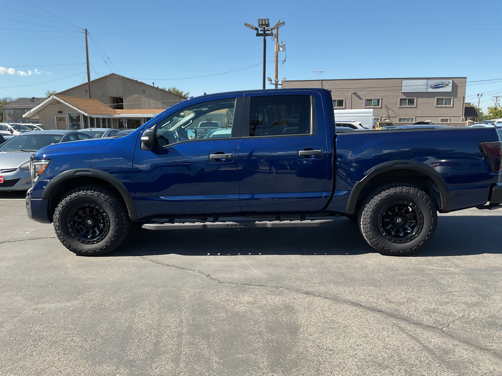 2021 Nissan Titan used crew cab pickup for sale at Peterson Auto Sales in Midvale, UT — photo 5 of 22