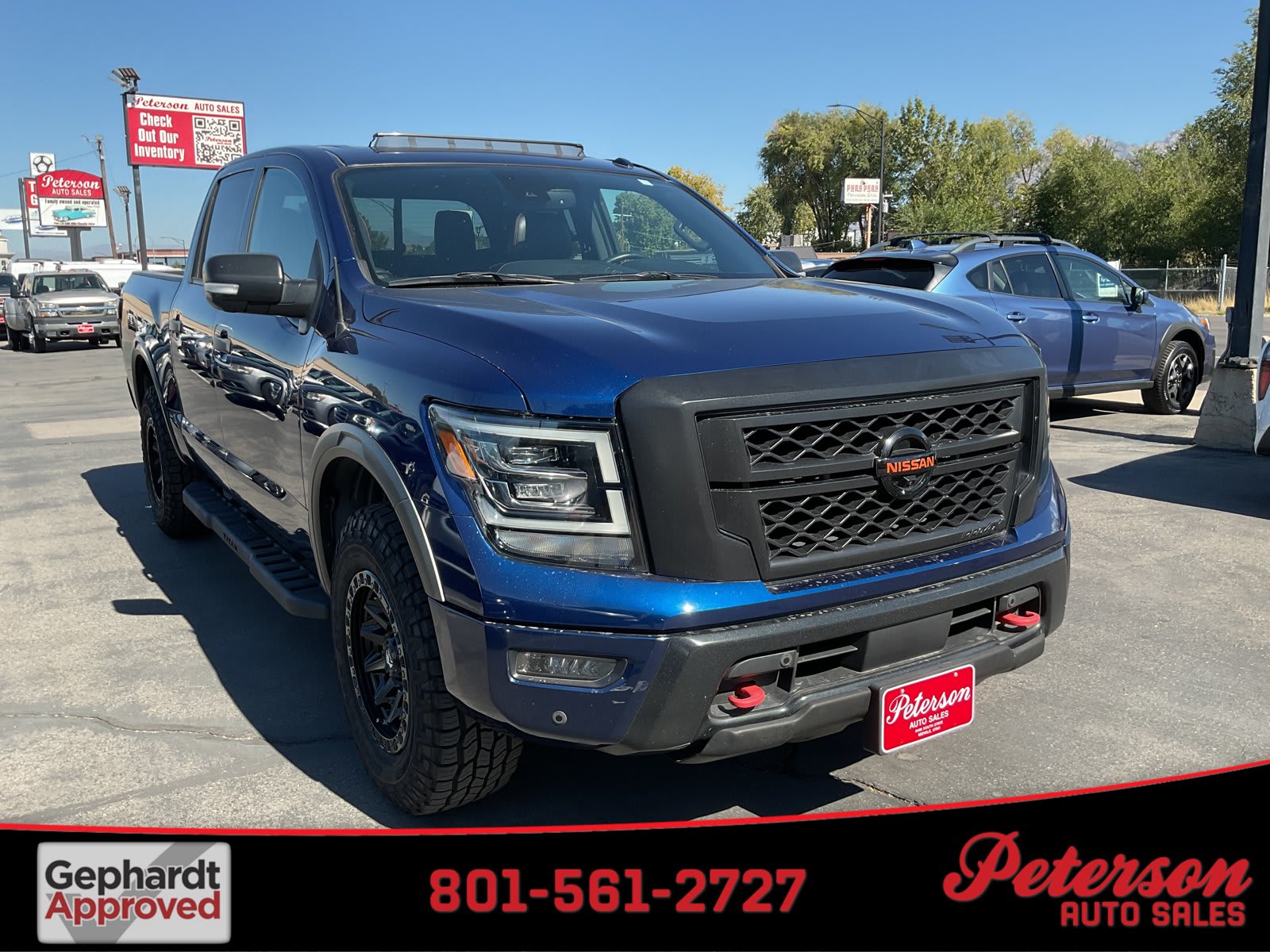 2021 Nissan Titan used crew cab pickup for sale at Peterson Auto Sales in Midvale, UT