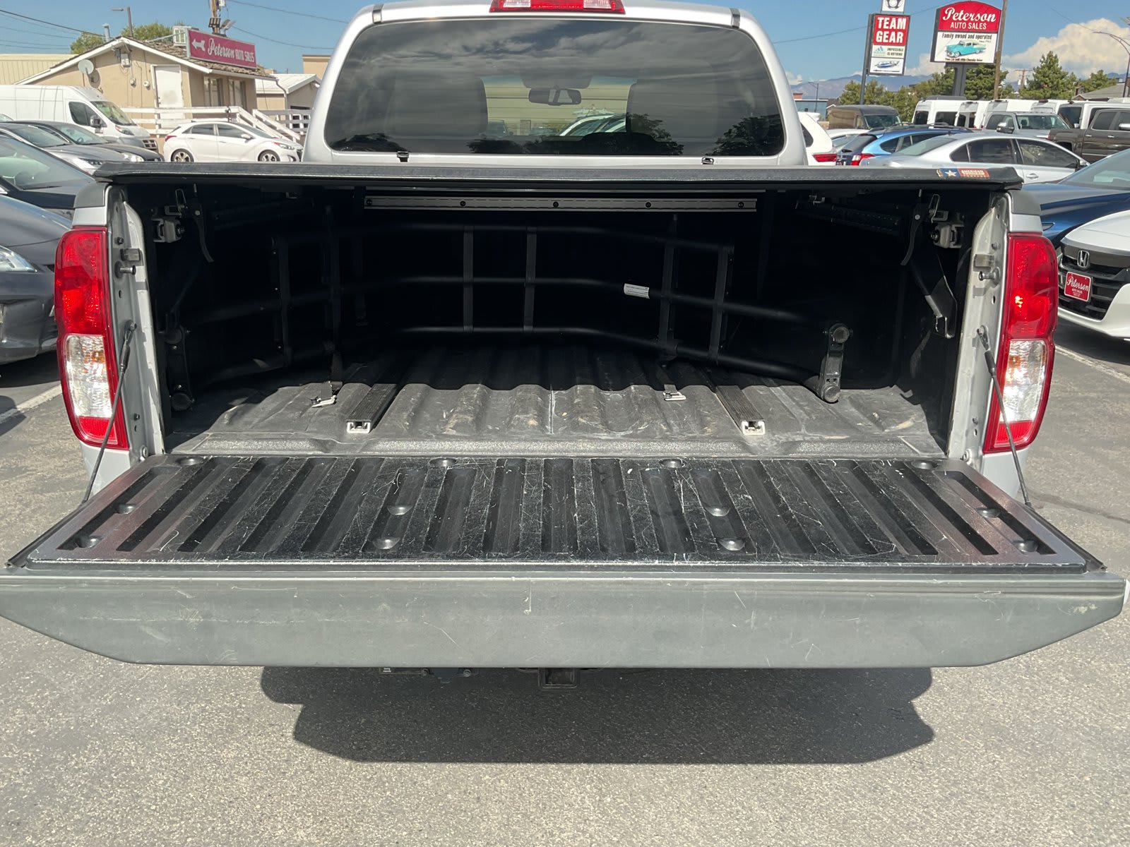 2013 Nissan Frontier used crew cab pickup for sale at Peterson Auto Sales in Midvale, UT — photo 9 of 20