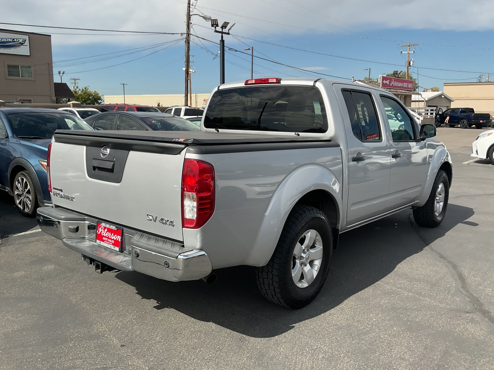 2013 Nissan Frontier used crew cab pickup for sale at Peterson Auto Sales in Midvale, UT — photo 6 of 20