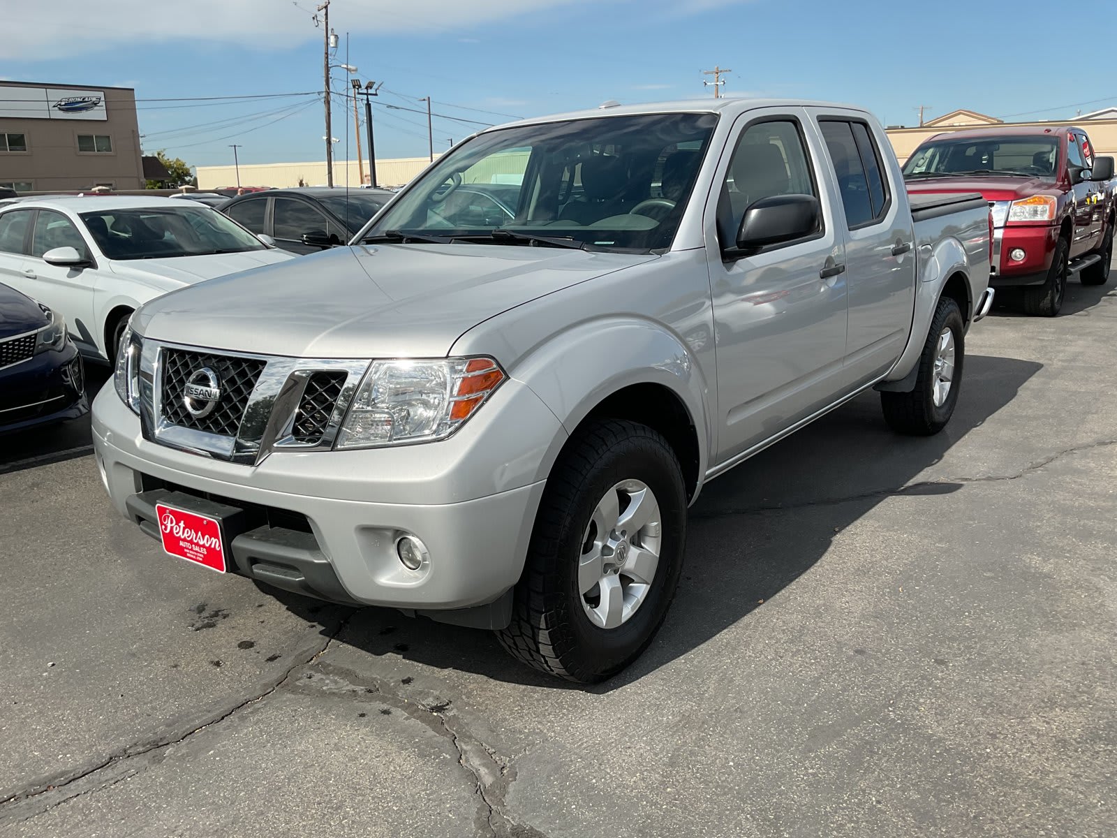 2013 Nissan Frontier used crew cab pickup for sale at Peterson Auto Sales in Midvale, UT — photo 2 of 20