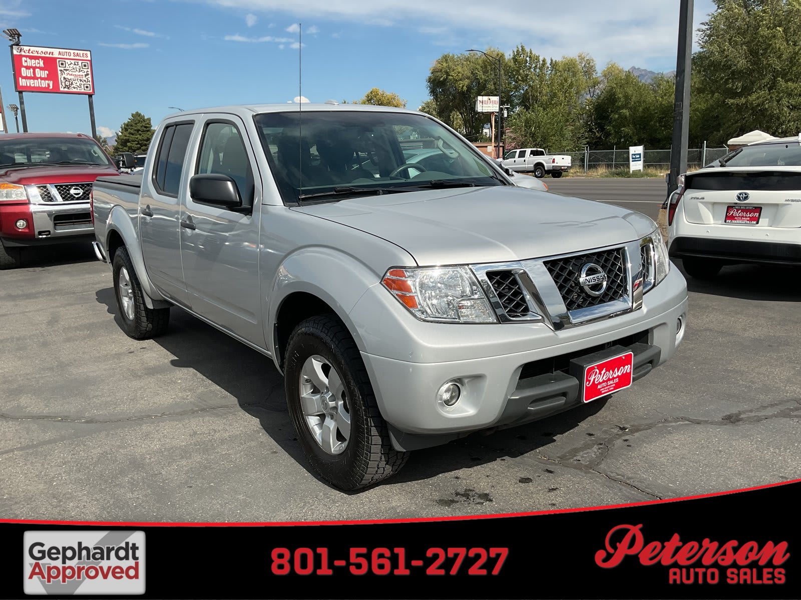 2013 Nissan Frontier used crew cab pickup for sale at Peterson Auto Sales in Midvale, UT