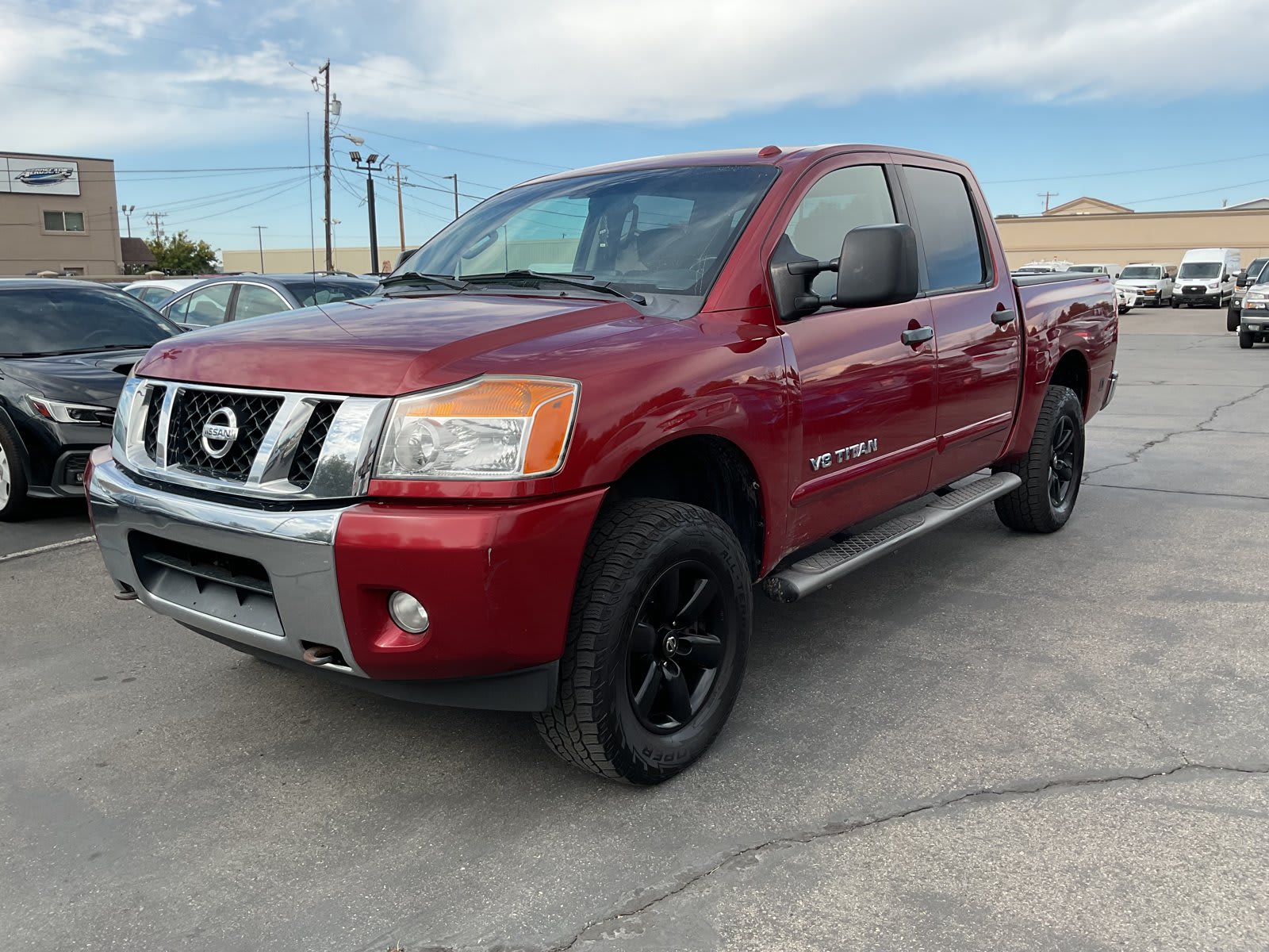 2013 Nissan Titan used crew cab pickup for sale at Peterson Auto Sales in Midvale, UT — photo 2 of 20