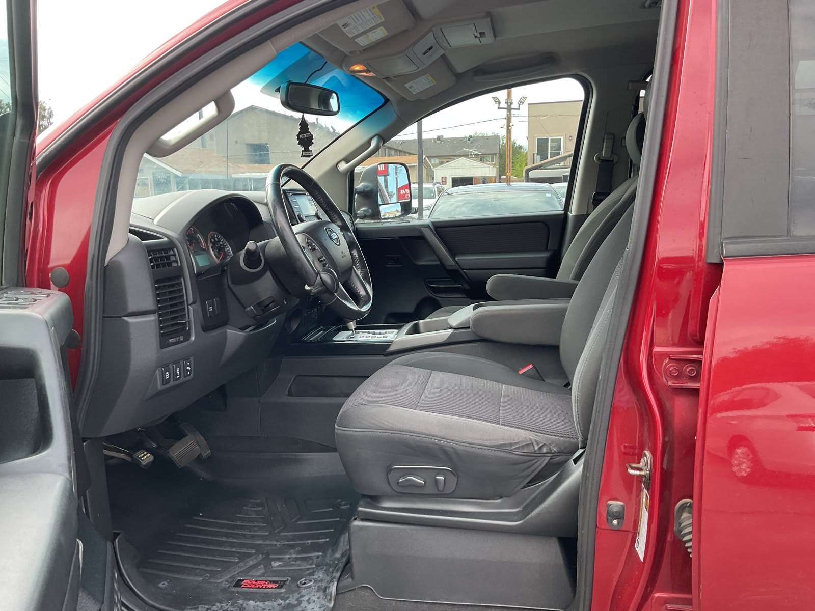 2013 Nissan Titan used crew cab pickup for sale at Peterson Auto Sales in Midvale, UT — photo 9 of 20