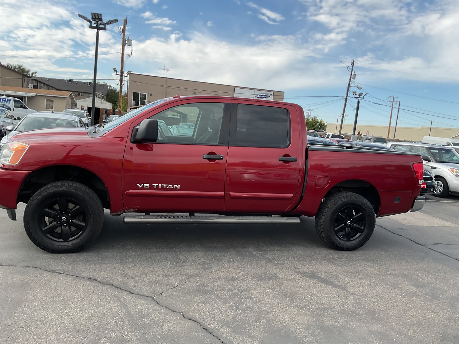 2013 Nissan Titan used crew cab pickup for sale at Peterson Auto Sales in Midvale, UT — photo 4 of 20