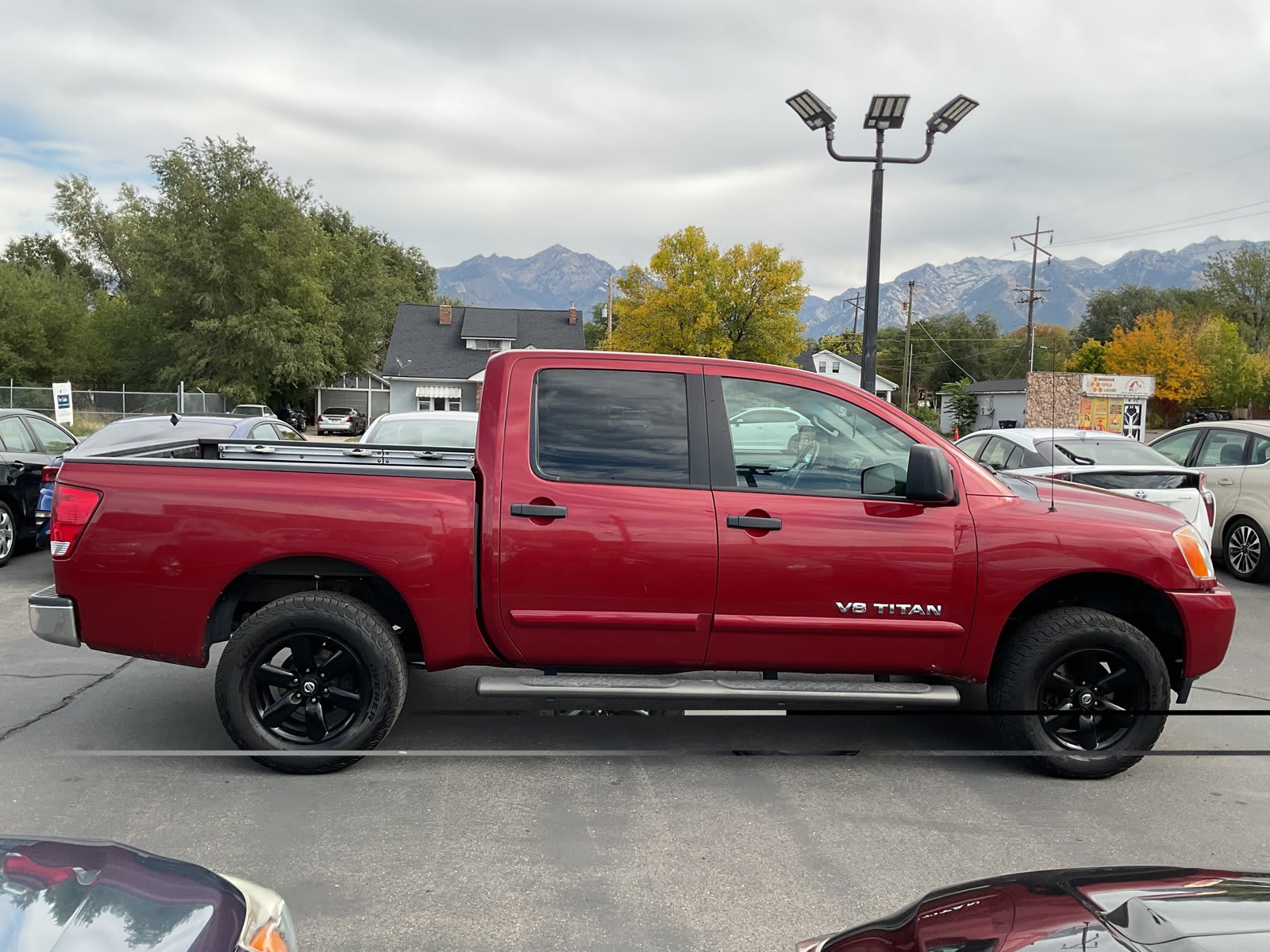 2013 Nissan Titan used crew cab pickup for sale at Peterson Auto Sales in Midvale, UT — photo 5 of 20