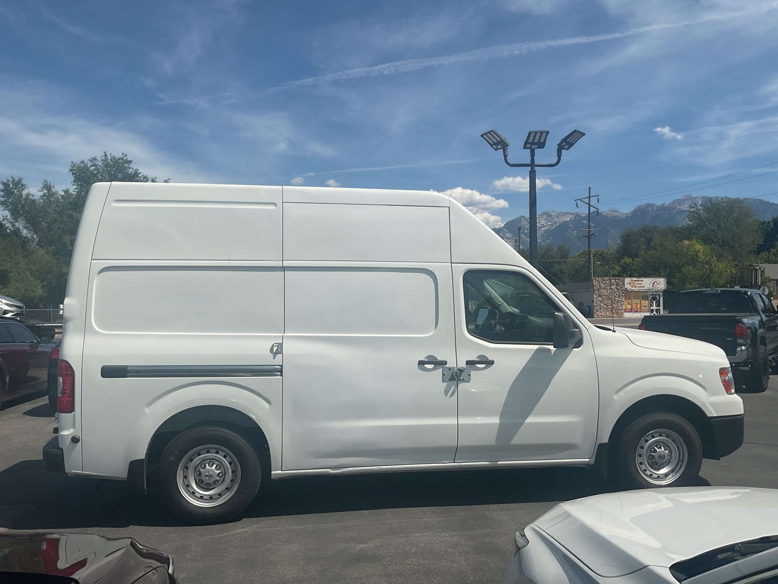 2019 Nissan NV Cargo used full-size cargo van for sale at Peterson Auto Sales in Midvale, UT — photo 3 of 20