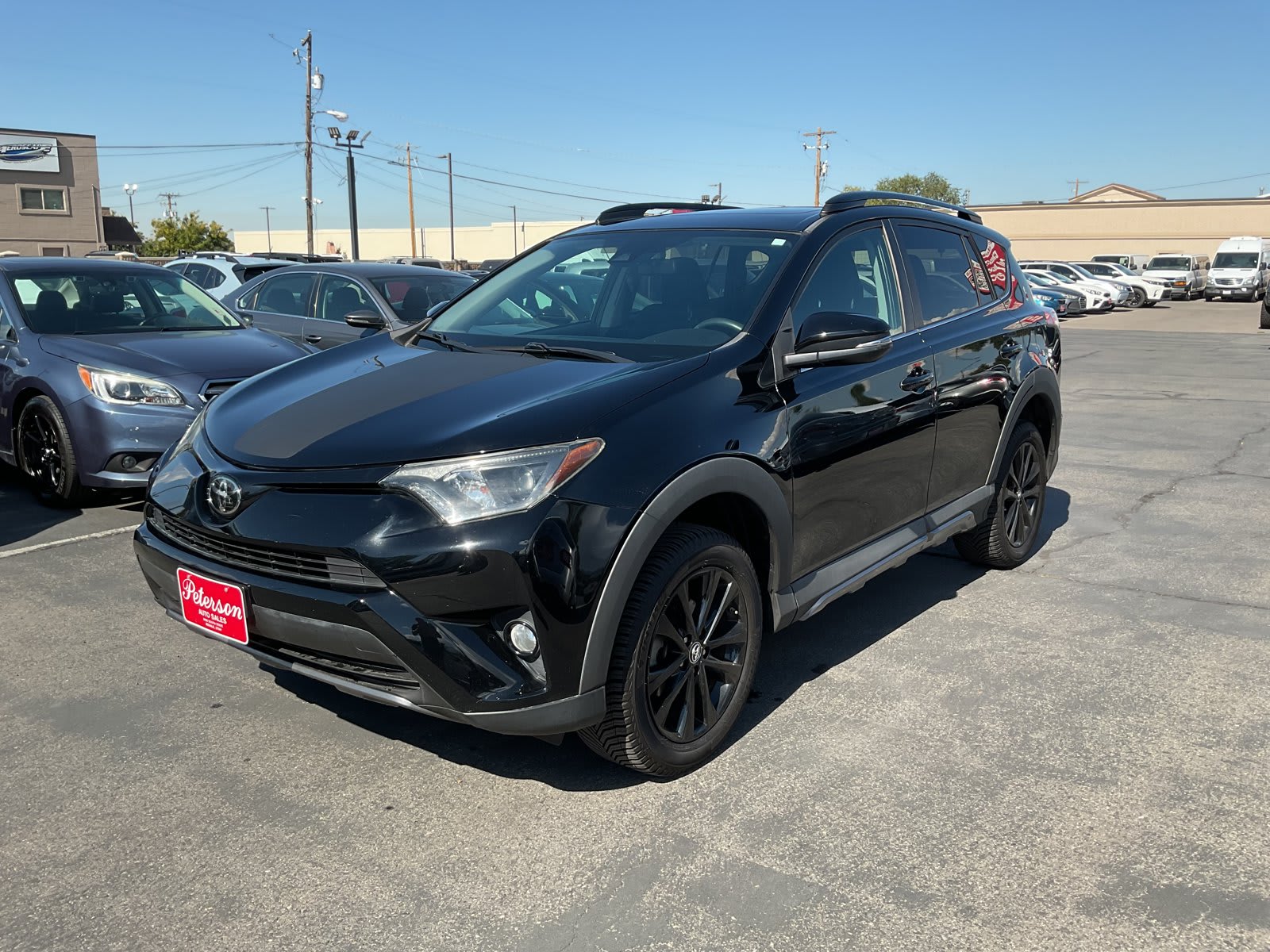 2018 Toyota RAV4 used sport utility for sale at Peterson Auto Sales in Midvale, UT — photo 2 of 20