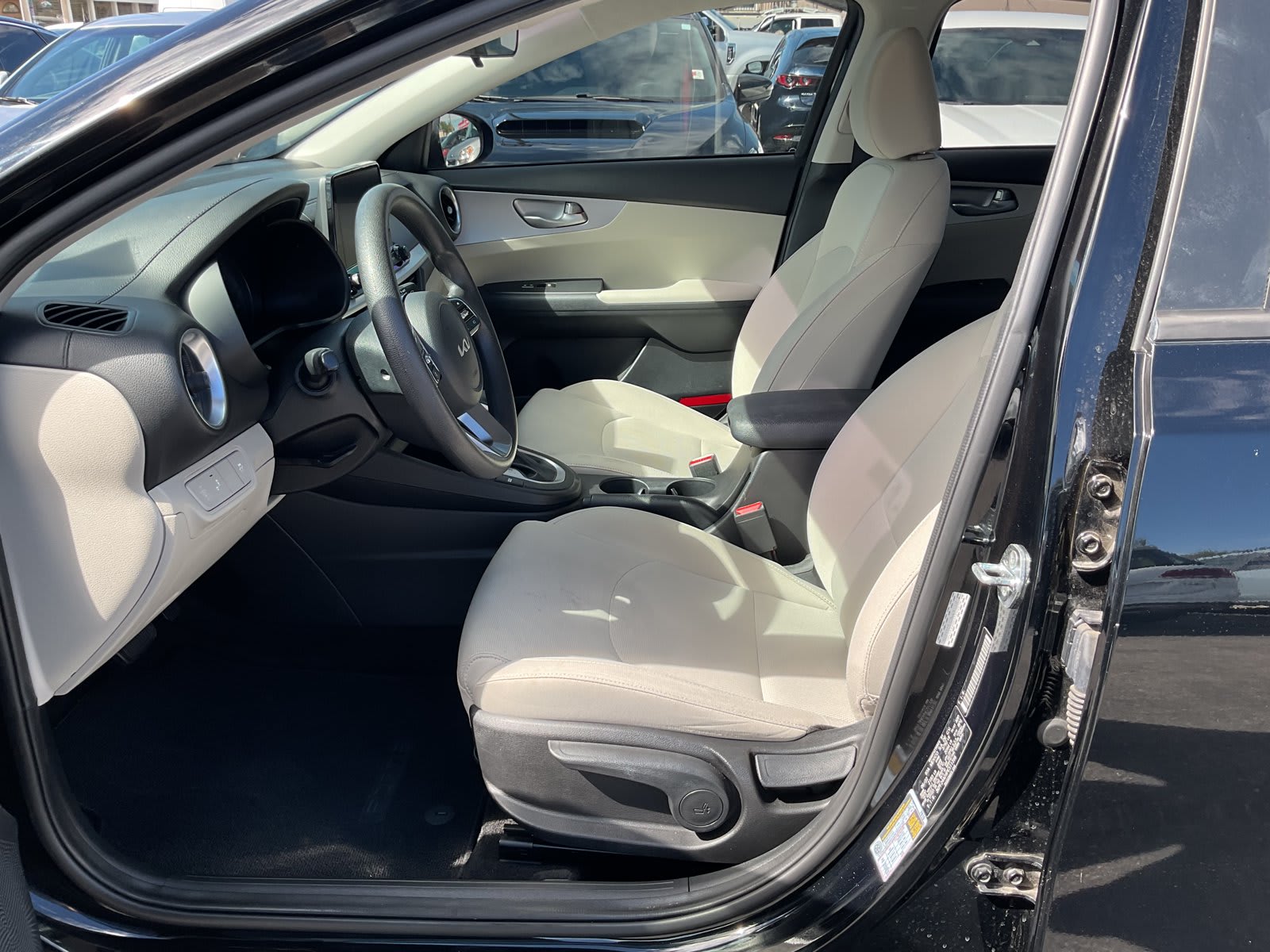 2023 Kia Forte used 4dr car for sale at Peterson Auto Sales in Midvale, UT — photo 11 of 21