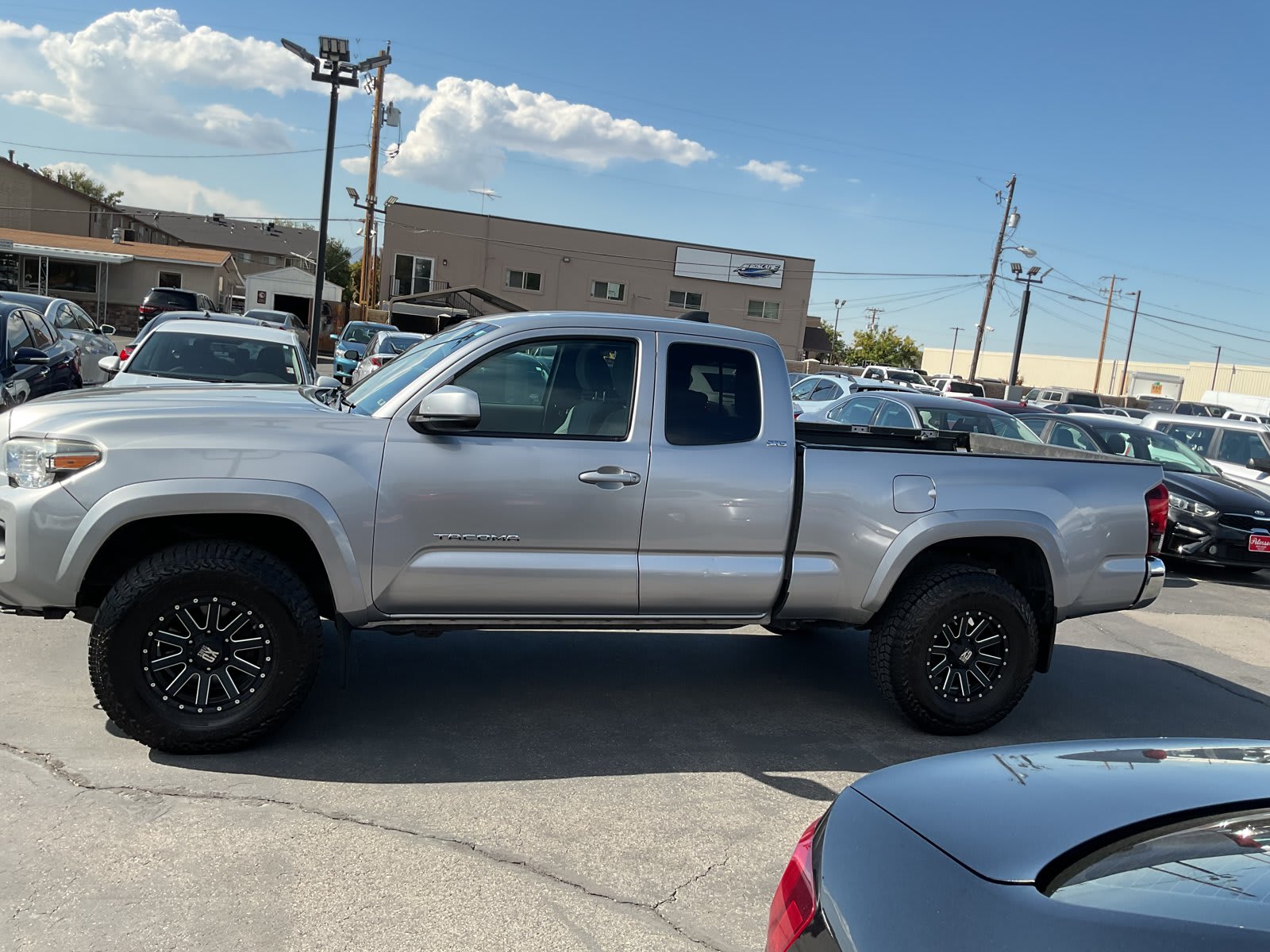 2021 Toyota Tacoma 4WD used extended cab pickup for sale at Peterson Auto Sales in Midvale, UT — photo 4 of 19