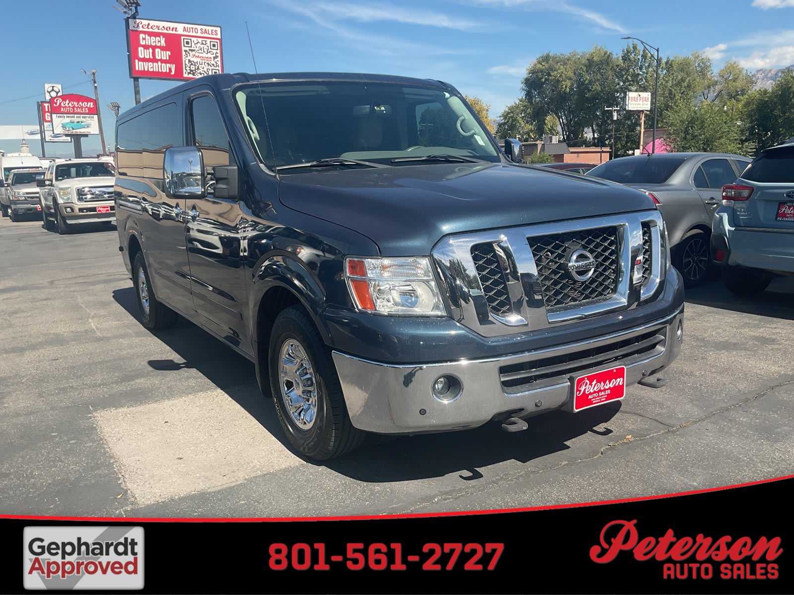 2017 Nissan NV Passenger used full-size passenger van for sale at Peterson Auto Sales in Midvale, UT